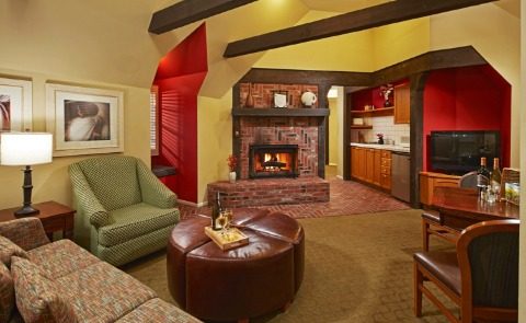 Living room area with chair and ottoman