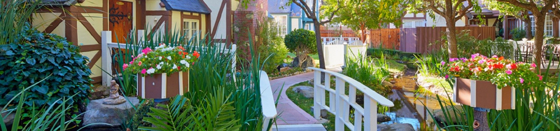 Outdoor walkway with small foot bridge